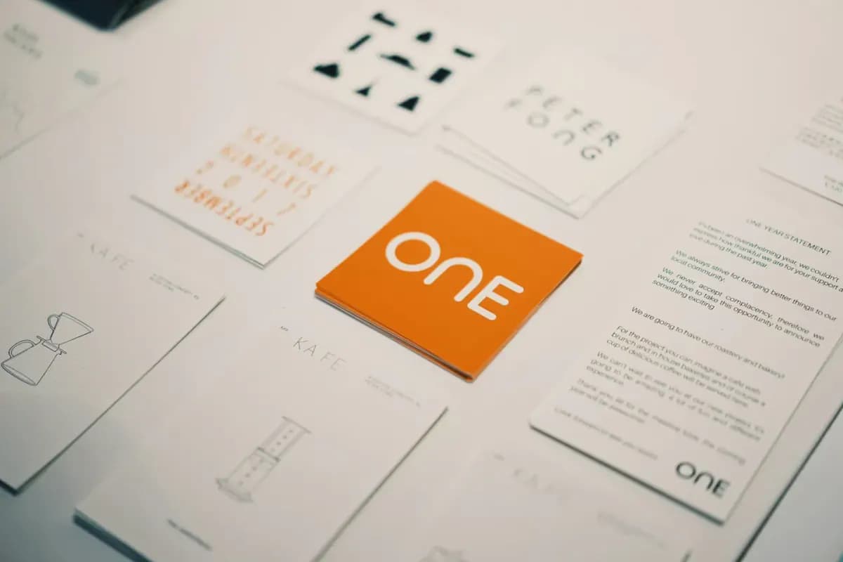 Orange card with one logo surrounded by other cards