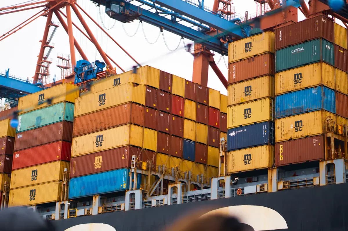 A large cargo ship loaded with lots of containers